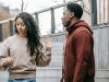 multiethnic couple arguing on street